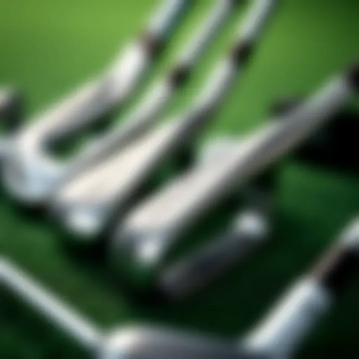 Close-up of various golf club types displayed on a green surface