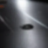 Close-up of a pristine iron surface reflecting light