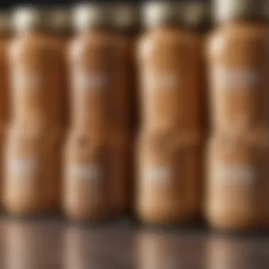 Variety of natural peanut butter jars lined up