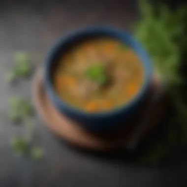 A colorful bowl of lentil soup garnished with fresh herbs