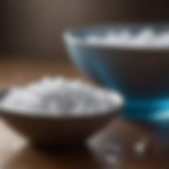 A close-up of a bowl of salt and a glass of water