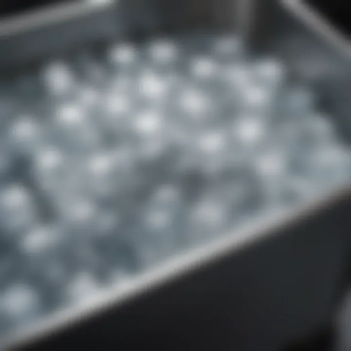 A close-up of ice cubes in a metal tub, emphasizing the cooling aspect of ice baths.