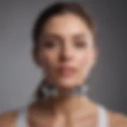 A person using a jaw exerciser device for facial workouts