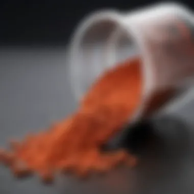 A close-up of nitric oxide powder in a measuring scoop next to nitric oxide pills