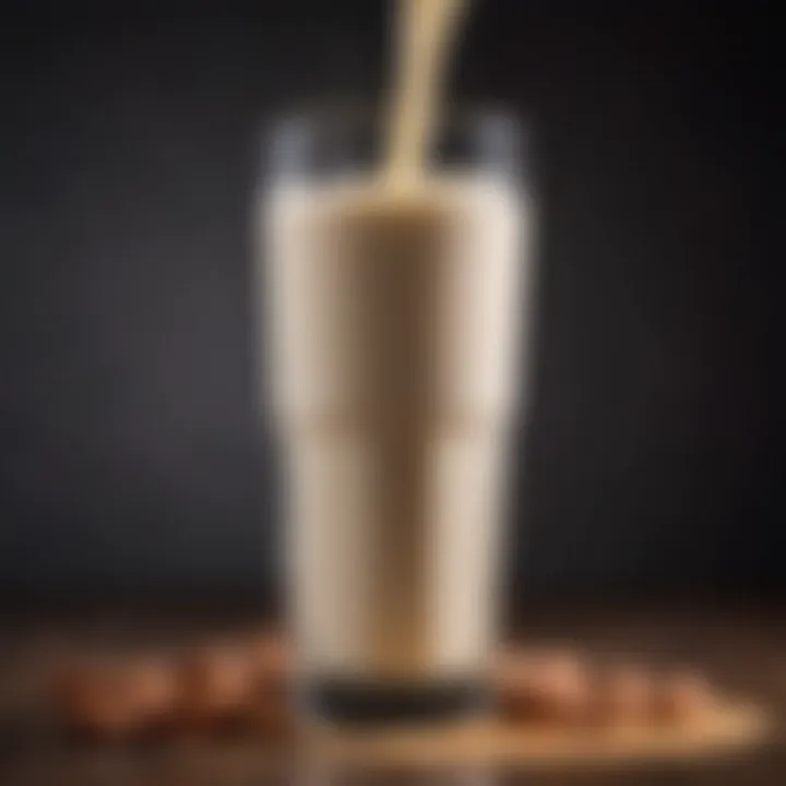 A close-up of creamy almond milk and protein powder in a blender.