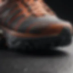 A close-up view of the sole of a stability running shoe showcasing its unique tread pattern.