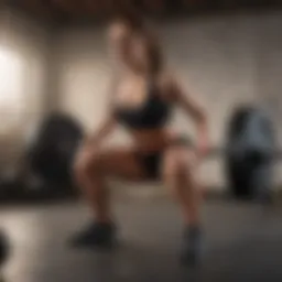 A person demonstrating a squat with weights