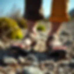 Stylish minimalist sandals on a rocky trail