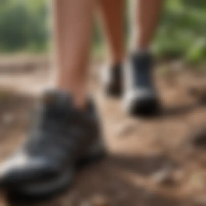 A close-up of walking shoes on a trail, emphasizing the importance of proper footwear.