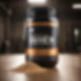 Whey protein powder in a scoop with a blurred gym background